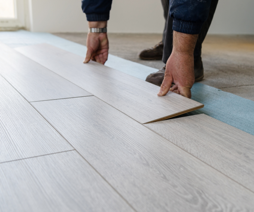Image of vinyl plank flooring being installed