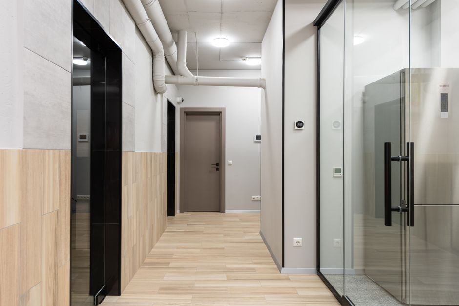 Commercial laminate flooring in a modern office showing durability and aesthetic appeal